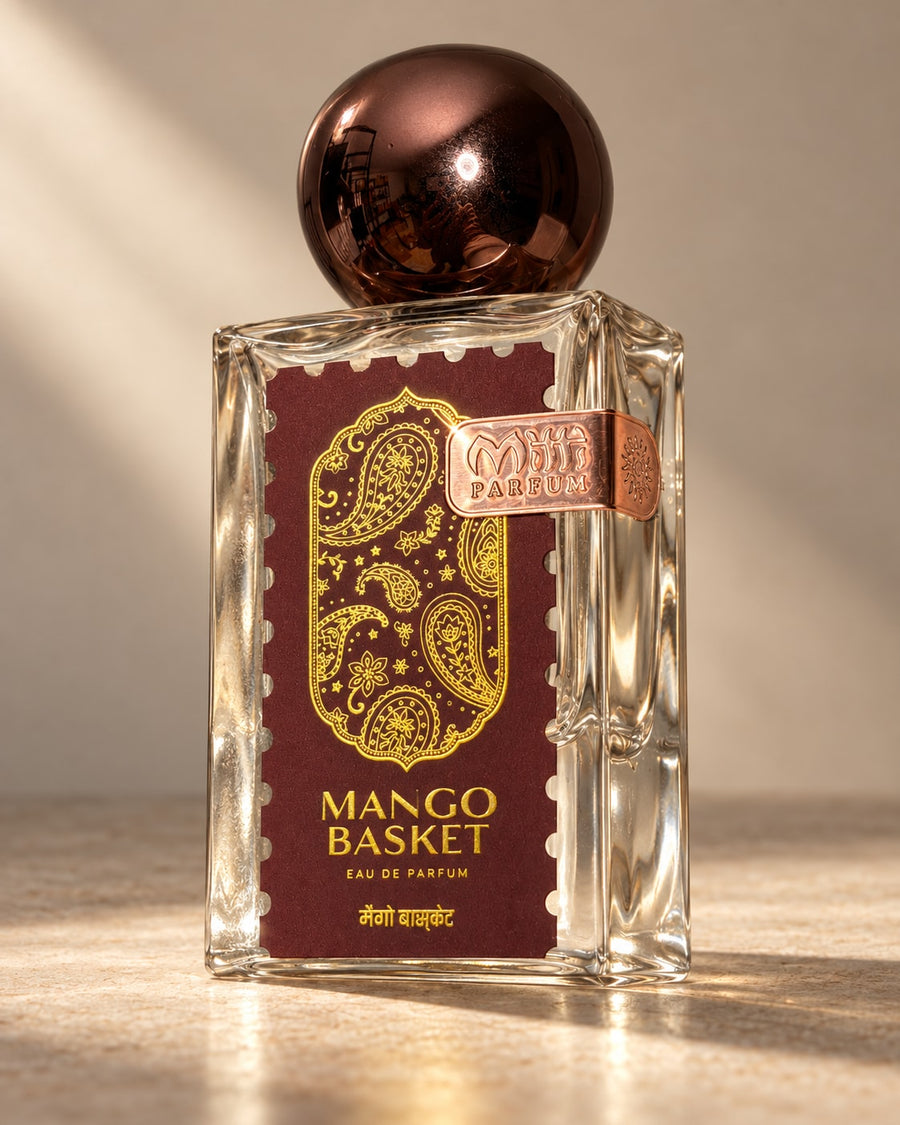 Mango Basket Eau de Parfum, a 35 ml bottle with a maroon and gold paisley label and a bronze cap.